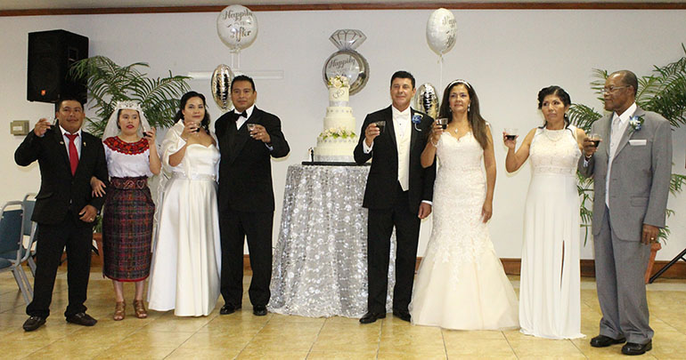A toast: The newlyweds raise a glass for their marriages. From left to right are Juan Pelico Abac and his wife Egidia Cuynch, Sergio Morales and his wife Iris, Calogero "Lillo" Tirone and his wife Marlene Esguerra, and Leonard Lawrence and his wife Zenaida Leon.