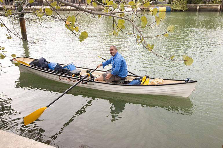 Greg Dougherty sets off from a Miami Beach canal on the first day of his 1,400-mile sea journey from Miami to New York.