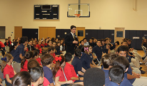 Andres Dones speaks in May at St. Louis Covenant School about his Project SHIELD film.