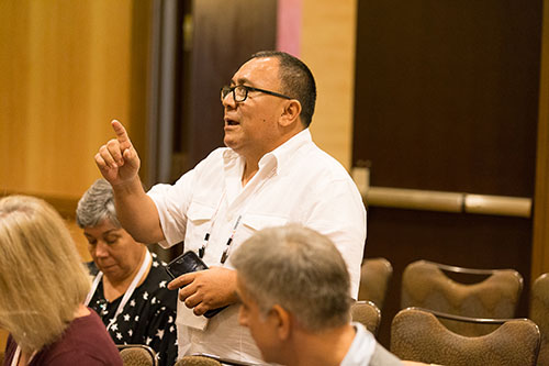 Deacon Edgardo Farias, who heads up detention ministry for the Miami Archdiocese, speaks at a meeting of Miami delegates following the 2017 Convocation of Catholic Leaders in Orlando July 1-4.
