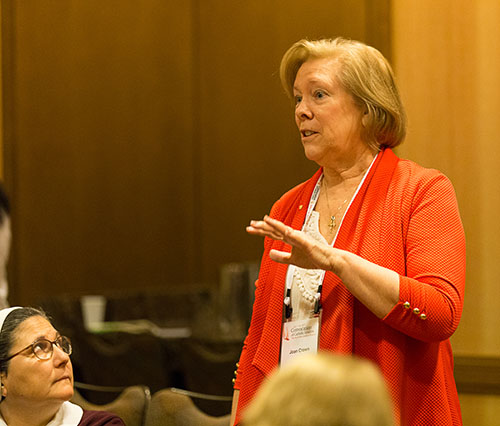 Respect Life Director Joan Crown talks at a meeting of Miami delegates following the 2017 Convocation of Catholic Leaders in Orlando July 1-4.