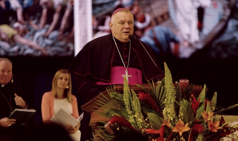Archbishop Thomas Wenski addresses a plenary session at the Convocation of Catholic Leaders in Orlando.