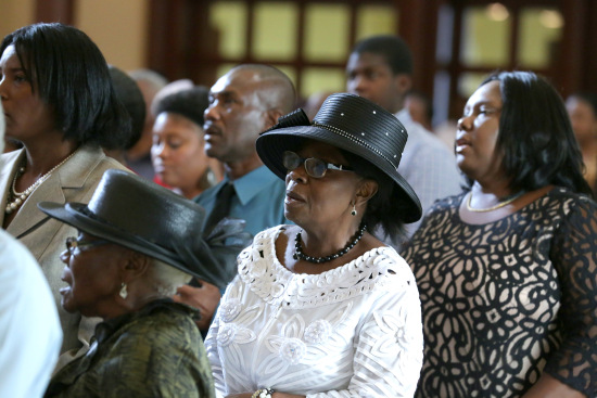 Worshipers take part in Haitian Mass July 2 at St. James Cathedral during the Convocation of Catholic Leaders in Orlando.