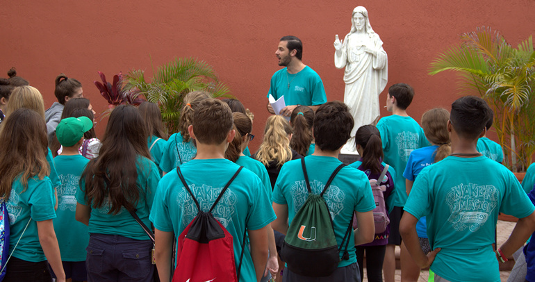 Jorge Santibanez speaks to the volunteers at St. Theresa School's Vacation Bible Camp.