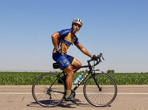 Matthew George pauses his ride to pose for a photo somewhere in Indiana near the end of July. He is part of a three-team, three-route Journey of Hope to raise funds and awareness this summer for a host of adult and youth disabilities, both mental and physical.