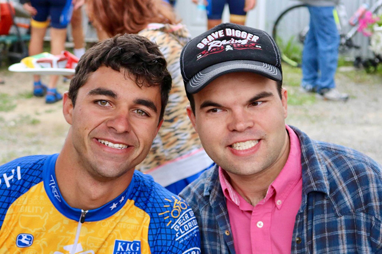 Matthew George poses with Tyler, one of the disabled adults he has met along his Journey of Hope ride from Seattle to Washington, D.C.