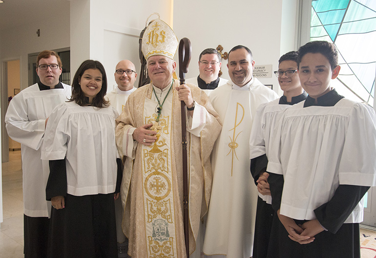 Archbishop Thomas Wenski poses with seminarians, altar servers and the pastor, Father Israel Mago, and parochial vicar, Father Luis Pavon, of Our Lady of Guadalupe Church after a Mass Aug. 5 that marked the start of the archbishop's ride to Key West with Great Adventure Ministries' Bear Woznick. The ride will be featured in the second season of Woznick's "Long Ride Home" reality series on EWTN.


The ride will be featured in the second season of Bear Woznick's "Long Ride Home" reality series on EWTN.