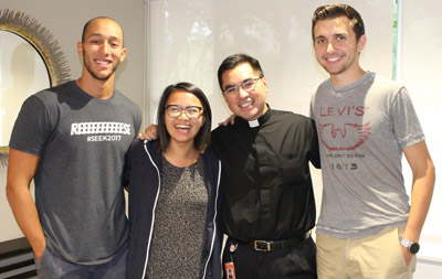 UCatholics Angel Carrasco, Trish Vega and Adam Wahl stop by to visit Father Phillip Tran during the school day at the UM Catholic campus ministry suite in Pentland House.