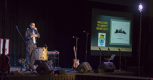 Christian hip-hop artist "Communion" performs for the hundreds of youths attending the 2017 Mercy Night.