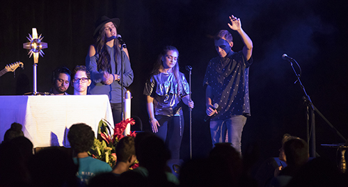 Christian music group EPIC the Band performs during the exposition of the Blessed Sacrament at the 2017 Mercy Night.