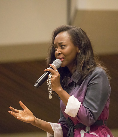 Holding a rosary, Immaculee Ilibagiza tells her story of faith, hope and forgiveness to the hundreds who came to see her at St. Bonaventure Church in Davie.