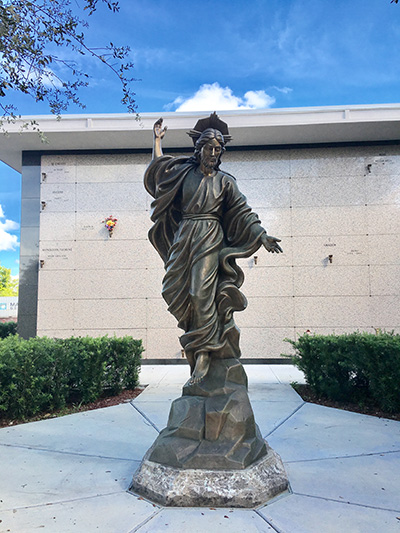 The first bronze statue at Our Lady Queen of Heaven Cemetery, Christ Ascending to the Father, is located in the new Resurrection Mausoleum complex.