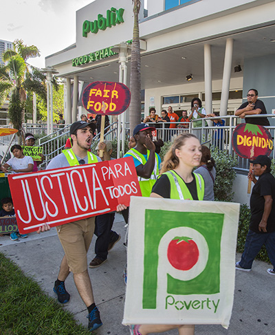 St. Thomas University and Barry University students joined members and supporters of the Coalition of Immokalee Farmworkers at the fourth annual March for Fair Food in downtown Miami Nov. 11. They walked to a Wendy's and a Publix, corporations that do not participate in the Fair Food Program.