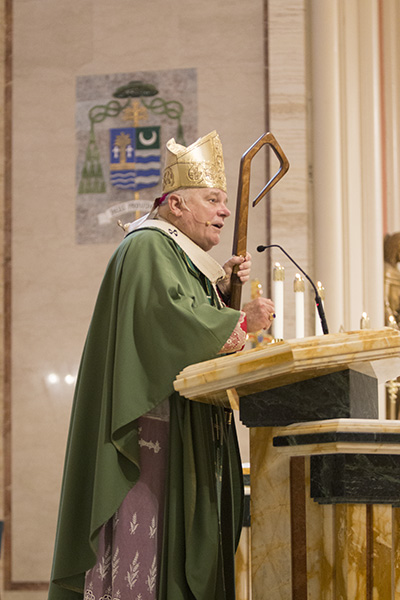 Archbishop Thomas Wenski preaches the homily at the annual ThanksForGiving Mass Nov. 19, thanking all the donors to ABCD, honoring three families with the One in Faith, One in Hope and One in Charity award and inducting new members into the Archbishop Coleman Carroll Legacy Society.