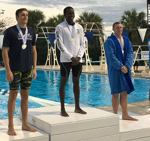 St. Brendan’s Irvin Hoost, center, won the 50-yard freestyle to help St. Brendan finish 20th with 35 points in the Class 2A state swim meet. Hoost also took fourth in the 100-yard freestyle in 46.04.