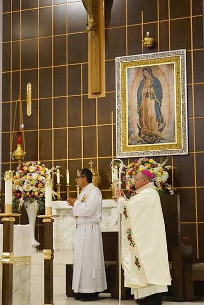Mass at Our Lady of Guadalupe Church in Doral was filled to capacity Dec. 12, as the parish marked the feast day of its patroness and the second anniversary of the dedication of their church and parish buildings. A gold crown, blessed by Auxiliary Bishop Peter Baldacchino,  has been added above the image of Mary.