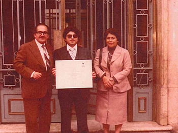 The future Bishop Enrique Delgado poses with his parents , Rafael and Carmen Delgado, after obtaining his degree in industrial engineering in his native Peru.