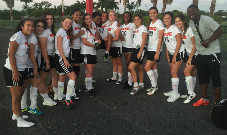 Pace High School's girls varsity soccer team pose for a group photo after defeating local rival Mater Lakes Academy (1-0).