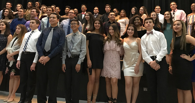 Msgr. Edward Pace High School's 48 National Honor Roll inductees pose for a photo during the December 4 dinner ceremony.