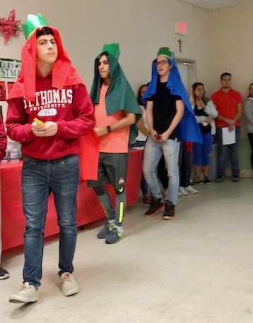 Puerto Rican students portray the Wise Men during a pageant at St. Thomas University.