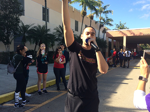 Alvaro Vega, aka Communion the rapper, performs some of his compositions during the Walk for Life hosted Jan. 13 at Archbishop McCarthy High School.