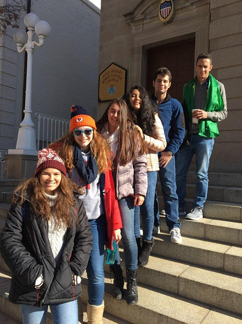 St. Thomas Aquinas High School students, from left, Shania Moscat, Paige Pokryfke, Phoenix Tabasso, Cristina Avila, Rene Padilla and Patrick De Freitas pose outside the Church of the Holy Rosary, where the 132-strong archdiocesan group celebrated Mass before the start of the 2018 March for Life.