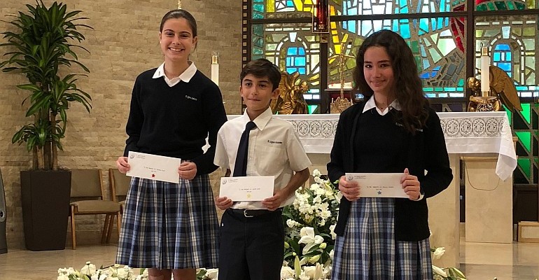St. Agnes Academy students show their Star Awards from the Independent Schools of South Florida. From left are Victoria Trap, Lucas Ruiz, and Nicole Beteta.