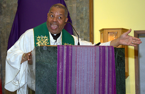 Father Chester Smith, a missionary for the Society of the Divine Word, preaches during the black Catholic revival at St. Helen Church, Lauderdale Lakes.