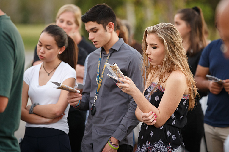 Members of Mary Help of Christians Parish in Parkland, join in a Friday Lenten Stations of the Cross service on Feb. 16 dedicated to the victims and survivors of the deadly Feb. 14 shooting at nearby Marjory Stoneman Douglas High School  which resulted in 17 student and faculty fatalities. At least one member of the parish was among the deceased, according to the parish administrator.