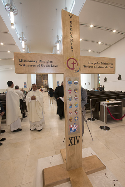 The cross of the V Encuentro stands at the entrance to Our Lady of Guadalupe Church, Doral, at the start of the Regional Encuentro's opening Mass.