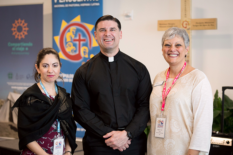 Posing for a photo during a break in the Southeast Regional Encuentro Feb. 23, from left: Eva Gonzalez, Hispanic Ministry director from the Archdiocese of Louisville, Ky., and Encuentro coordinator for Region V; Father Rafael Capo, director of the Miami-based Southeast Regional Office for Hispanics and the Southeast Pastoral Institute (SEPI); and Vivi Iglesias, a Catholic Relief Services staff person in St. Petersburg who serves as Encuentro coordinator for Region XIV.