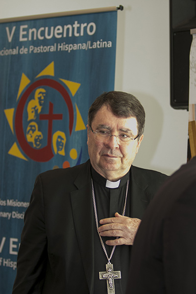 Archbishop Christophe Pierre, papal nuncio to the U.S., stops by the final working session of the Southeast Regional Encuentro Feb. 24, before celebrating the closing Mass with the delegates.