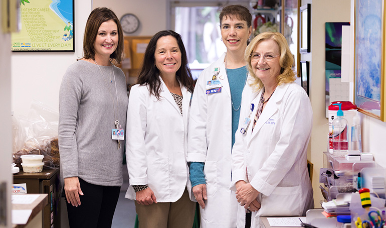 At Holy Cross Hospital in Fort Lauderdale, members of the Sexual Trafficking and Exploitation Program (STEP) program will link medical staff with community resources to provide a holistic response to human trafficking in South Florida. From left are Amy Corderman, manager of community outreach; Valerie Fox, faith community nurse coordinator; Kim Saiswick, director of community outreach and community benefit ministry officer; and Janet Jones,  clinical education coordinator/school health.