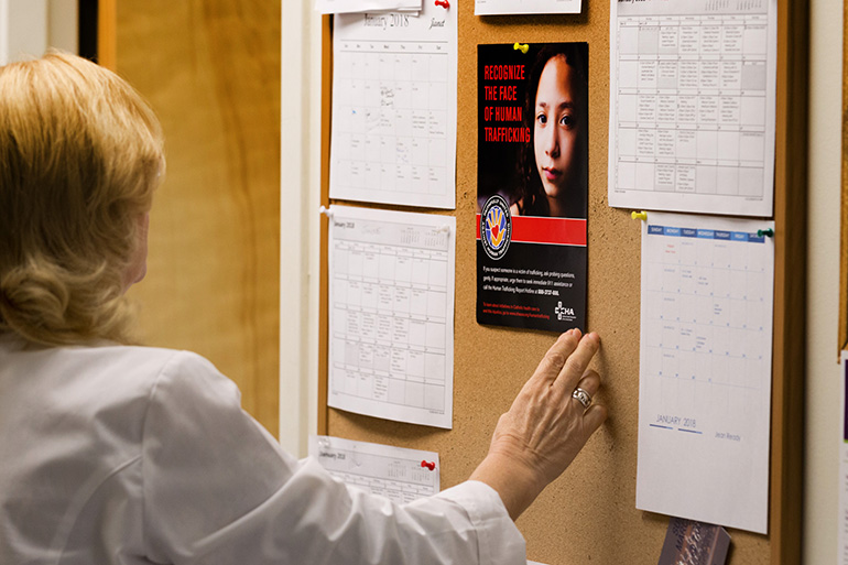 A public awareness poster at Holy Cross Hospital in Fort Lauderdale calls attention to the problem of human trafficking. The hospital is launching a Sexual Trafficking and Exploitation Program (STEP) program linking medical staff with community resources to provide a holistic response to sexual and human trafficking in South Florida.