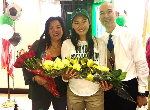 Msgr. Edward Pace High senior Grace Li poses with her father, Pace alumnus and now faculty member Phillip Li, and her mother, Alice Li.