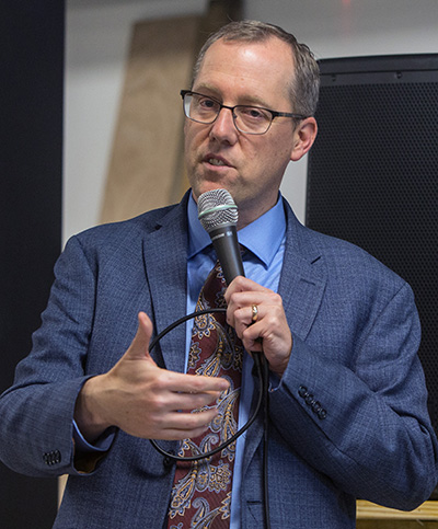 Tim Gray addresses young adults during a Theology on Tap session at The Tank Brewing Company.