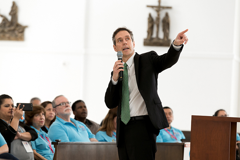 Sean Callahan, president and CEO of Catholic Relief Services, the official international humanitarian agency of the U.S. bishops, speaks Feb. 23 to 300 mostly Hispanic leaders from 30 dioceses in the southeastern U.S., who were gathered at Our Lady of Guadalupe Church in Doral for the Southeast Regional Encuentro, Feb. 22-24.