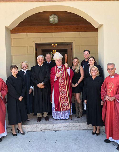 Archbishop Thomas Wenski poses with Monroe County judges after annual Red Mass at St. Mary Star of the Sea Basilica in Key West. The noon Mass brought a goodly number of lawyers and parishioners to pray for Holy Spirit to guide members of the Bar in imitation of St Thomas More.