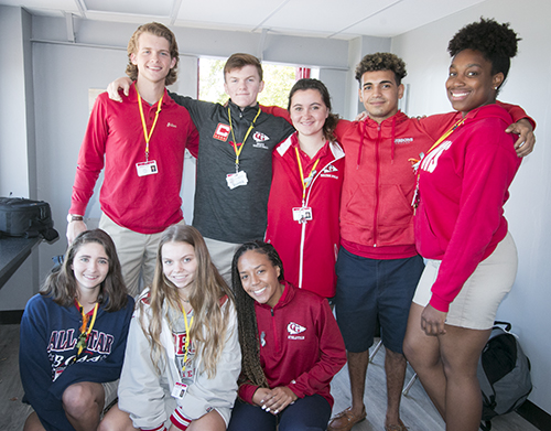 Organizers of the March 14 walkout in solidarity with the Parkland victims pose in the press box of the football field at Cardinal Gibbons High School after the end of the walkout. From left, top: Seniors James Carroll (who flew the drone that captured the heart they created on the football field); Ryan Keleher, Megan Gidlow, Gabe Gibson and Stella St. Georges; bottom, from left: Marguerite Farrell, Sarah Paige and Mackenzie Dulimba.