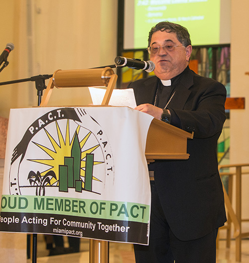 Miami Auxiliary Bishop Enrique Delgado recites the opening prayer at PACT's annual Nehemiah Action Assembly, March 19, 2018 at Notre Dame d'Haiti Church, Miami.