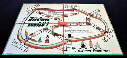 "Juden Raus (Jews Out)" was a Nazi-designed board game for children. The goal was to collect as many Jews as possible and send them to Palestine. The picture is part of the "State of Deception" exhibit at the Holocaust Documentation and Education Center.