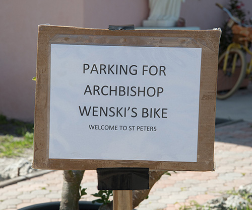 Knowing the archbishop likes to ride to the Keys on his motorcycle, parishioners at St. Peter made sure to designate a parking space.