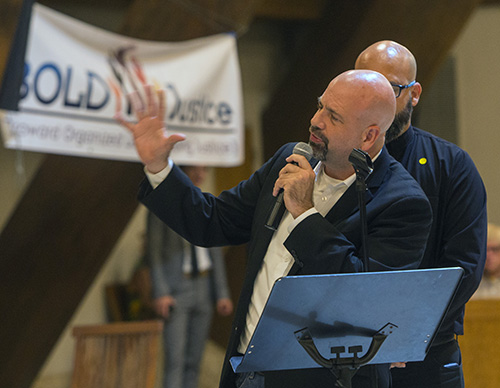 Rev. Kennedy McGowan, of First Presbyterian Church of Hollywood, addresses a question to Broward Sheriff Scott Israel during BOLD Justice's 11th annual Nehemiah Action assembly, held April 23 at St. David Church in Davie.