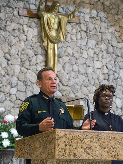 Broward Sheriff Scott Israel addresses BOLD Justice members as Rev. Andrea Byer-Thomas, of Village United Methodist Church in North Lauderdale, stands next to him. Israel spoke at BOLD Justice's 11th annual Nehemiah Action assembly, held April 23 at St. David Church in Davie.