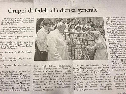 A photo in the Osservatore Romano April 5 features an image captured the moment Marian Center performers presented Pope Francis with the quilt the school's students had made.