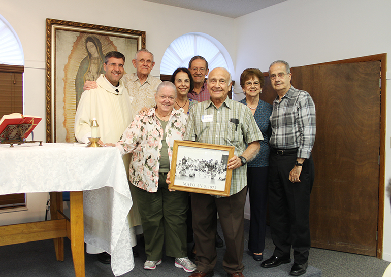 Some of the founding couples attended the closing Mass for Camino’s 45th anniversary. In the picture, Father Manny Alvarez, pastor of Immaculate Conception Church in Hialeah; Pedro (Papucho) Peláez; Conchita and Carlos Aguilar; Emilita and Rene Melian. Front, Martha (Mamucha) Peláez and Alfredo Jacomino, who held the photograph taken when the first Camino was taken, on May 4-5, 1973.