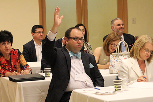 Jerry Rodriguez volunteers during Sally Mulhern's presentation on estate planning at the Legacy Planning Summit hosted by the Archdiocese of Miami Office of Development May 8.