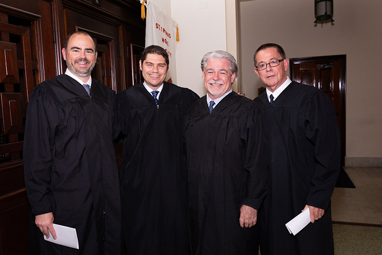 Judges Tom Coleman, Michael Davis, Dennis Bailey and Tim Bailey pose at the annual Red Mass of the St. Thomas More Society for South Florida, May 15 at St. Anthony Church in Fort Lauderdale.