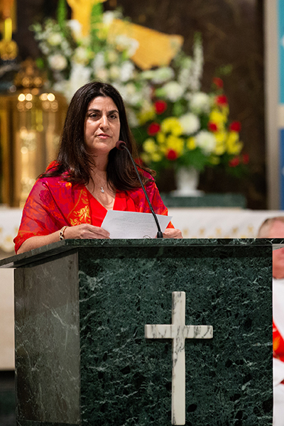 Jamie Finizio Bascombe proclaims the first reading at the annual Red Mass of the St. Thomas More Society of South Florida, held May 15 at St. Anthony Church in Fort Lauderdale.