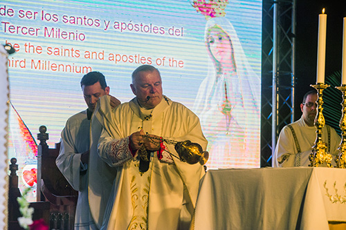 Archbishop Thomas Wenski incenses the altar while celebrating Mass with participants in the Third International Congress in Honor of the Hearts of Jesus and Mary.